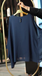 شومیز سرمه‌ای زنانه از پارچه حریر نگینی با طراحی نگین‌کاری هندسی، مناسب سایز 38 تا 52