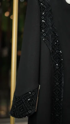 مانتو بلند سایز بزرگ زنانه با طراحی خاص و خرجکار مخمل