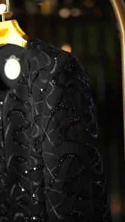 مانتوی مجلسی زنانه با منجوق‌دوزی کامل و طراحی خاص مناسب مجالس رسمی