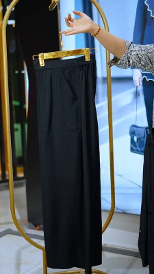 ست شومیز و شلوار زنانه مشکی با گلهای برجسته از پارچه کرسپو فری سایز