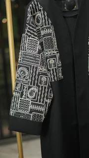 مانتو بلند زنانه لینن مشکی مدل توشار یقه هفت جلو باز با خرج‌کار خاص