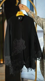 مانتوی مجلسی زنانه کرپ مرویجت با گل برجسته پایین و آستین سایز 38 تا 48 قد 80 سانت